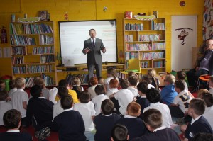 Minister Cannon speaking in the library